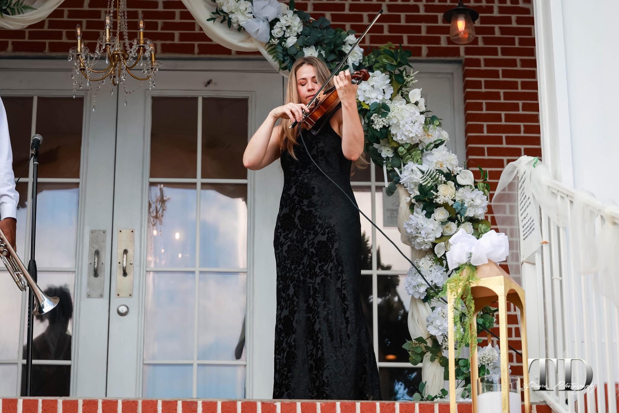 Violinist performing at a wedding ceremony